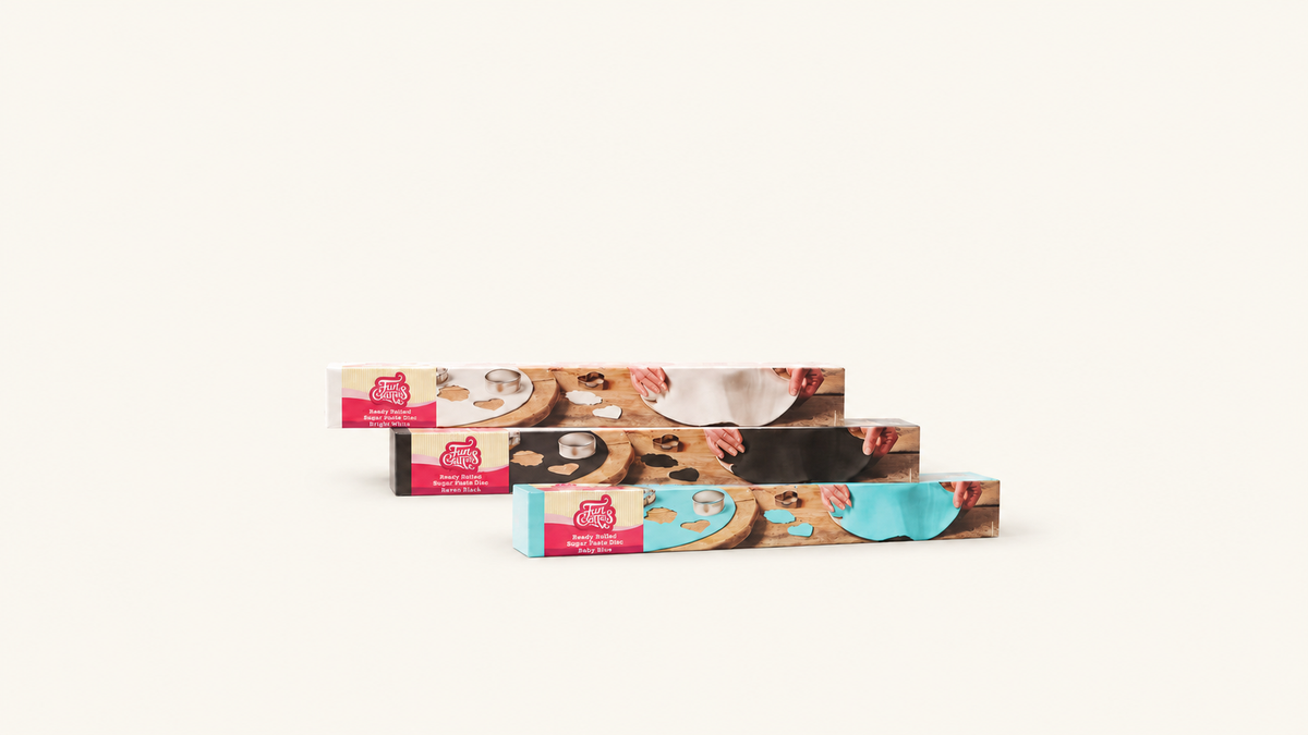 Pâte à sucre en Rouleau — sélection sur fond crème uni Patissland